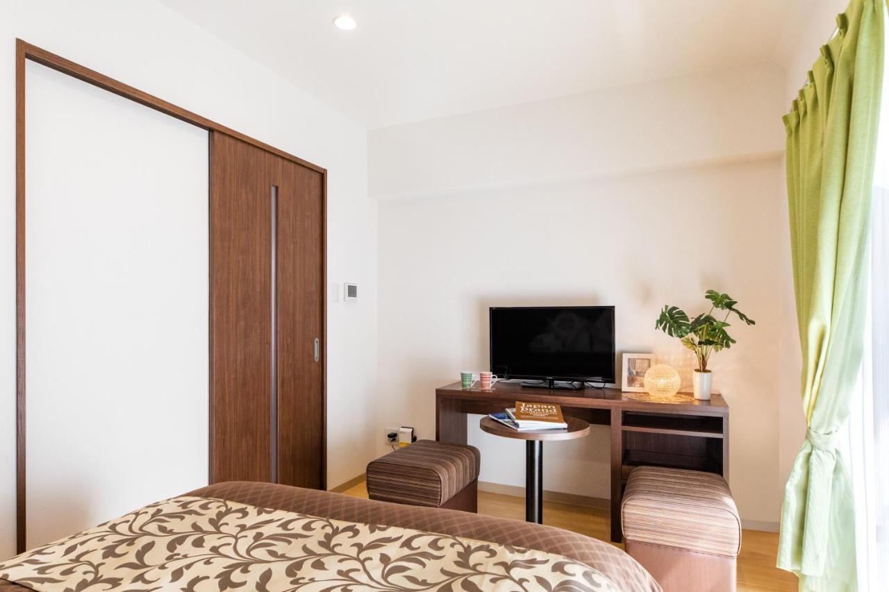 มิสเตอร์คินโจะ อิน มัตสึโอะ Aparthotel นาฮะ ภายนอก รูปภาพ